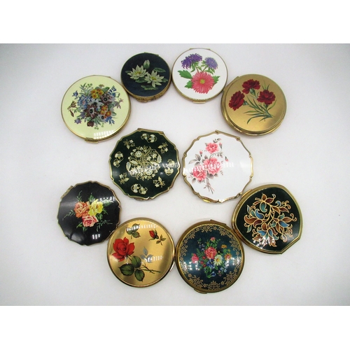 249 - Seven Stratton compacts with floral covers, a Kigu compact with floral cover and two other compacts ... 