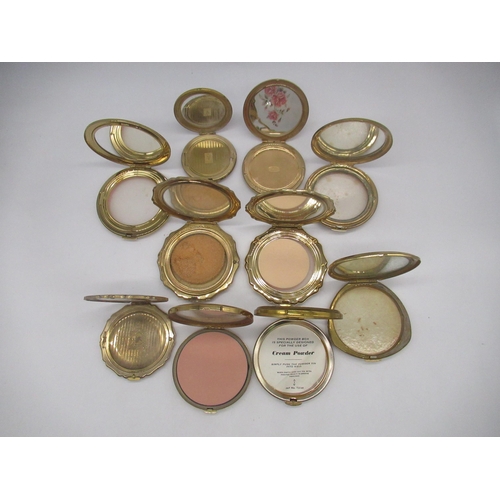 249 - Seven Stratton compacts with floral covers, a Kigu compact with floral cover and two other compacts ... 