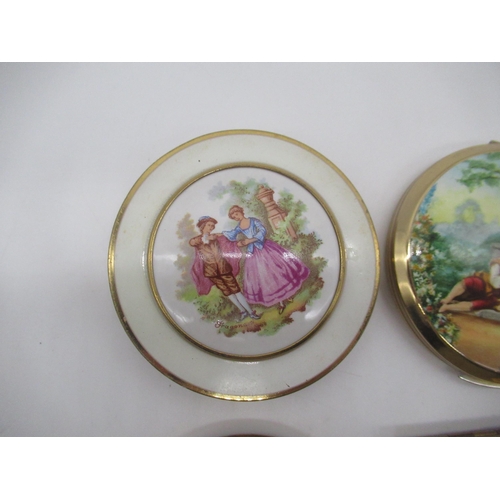 272 - Three Stratton compact with romantic scenes, a Mascot compact with cameo style cover, a Zenette comp... 