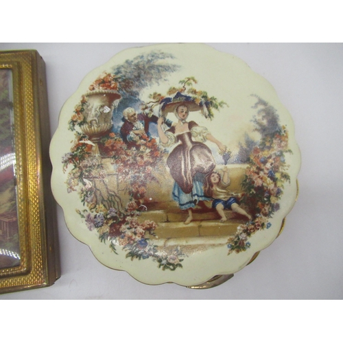 272 - Three Stratton compact with romantic scenes, a Mascot compact with cameo style cover, a Zenette comp... 