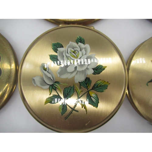 253 - Three Stratton compacts with printed floral pattern on brushed metal ground, Le Rage compact with pr... 