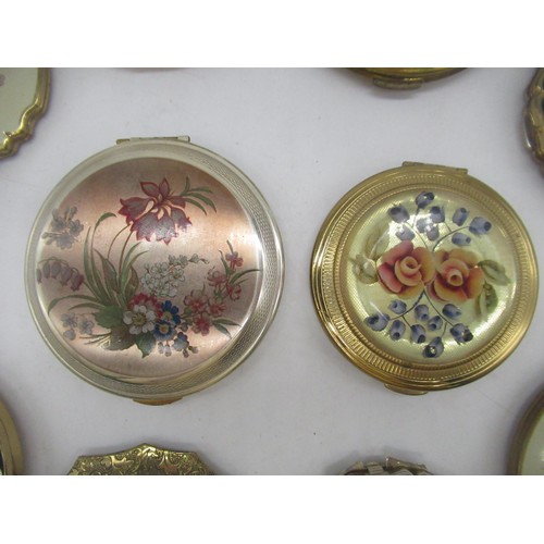 260 - Four Stratton compacts all with floral covers, three similar Kigu compacts, a Regent of London compa... 