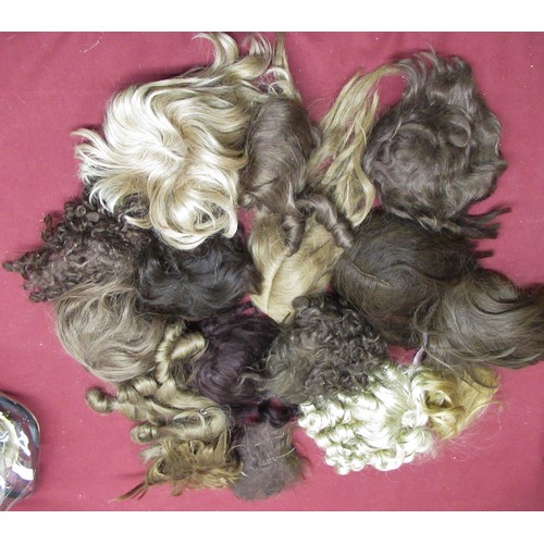 898 - Collection of Doll's wigs and accessories including bonnets, socks and shoes