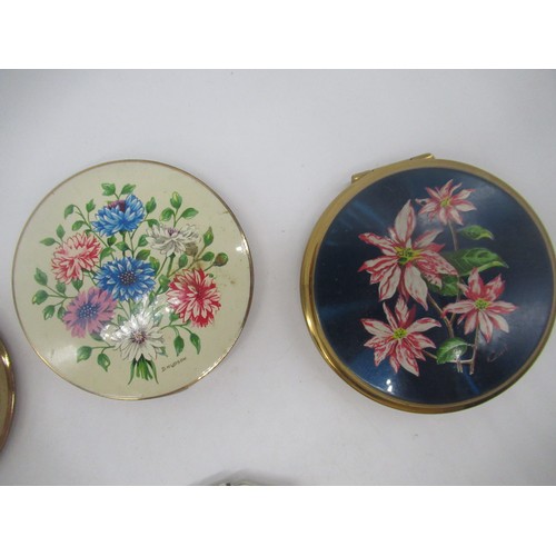 255 - Stratton compact with guilloche enamel floral cover, eight Stratton compacts with floral covers and ... 