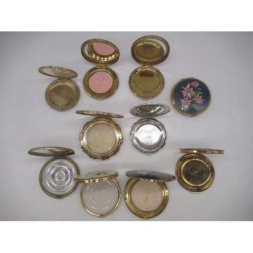 255 - Stratton compact with guilloche enamel floral cover, eight Stratton compacts with floral covers and ... 