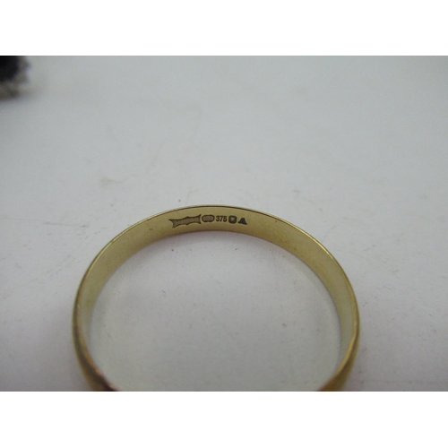 43 - 9ct yellow gold wedding band, stamped 375, size R, and another similar, size S, and a hallmarked 9ct... 