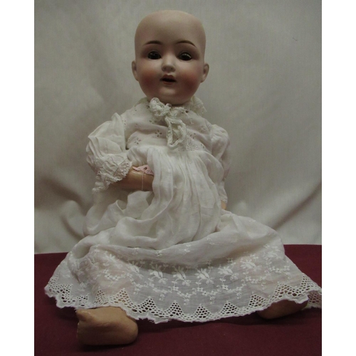 874 - Erste Steinbacher model 23 7 1/2 bisque headed doll, wearing a lace nightgown, H45cm