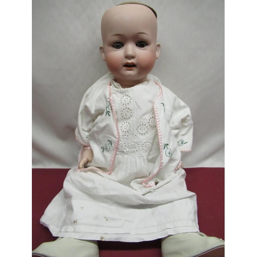 875 - Heubach Koppelsdorf bisque headed doll model 267. 6 1/2 wearing embroidered felt jacket, white night... 