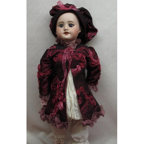 879 - SFBJ French bisque headed doll stamped 6 to the base of the neck, wearing crinoline bonnet and jacke... 