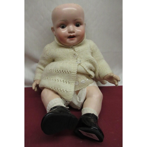 880 - Heubach Koppelsdorf model 300.2 bisque headed doll, wearing a knitted dress and jacket with patent b... 