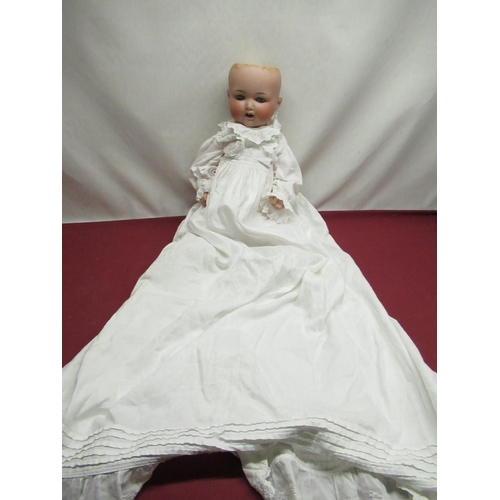 883 - Armand Marseille Koppelsdorf 1330 A 12 M bisque headed doll wearing a christening gown with lace det... 