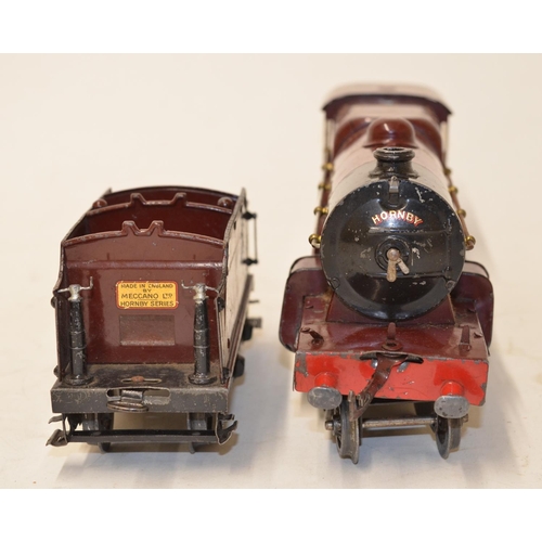 595 - Large scale Hornby clockwork metal 6100 LMS Royal Scot steam train, no key. 

Length with tender 42c... 