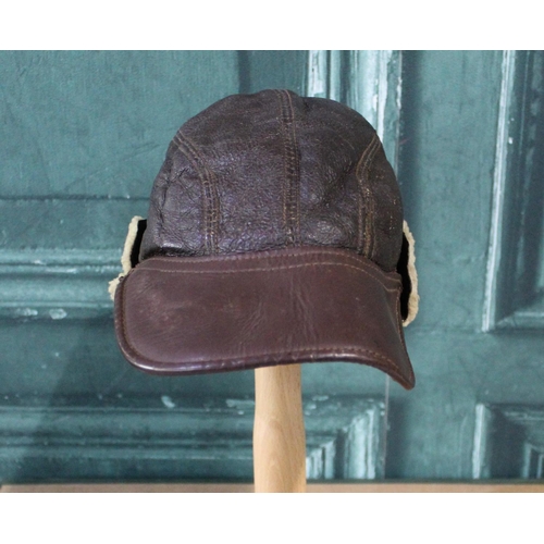 107 - WWII period USA sheepskin flying cap with leather peak