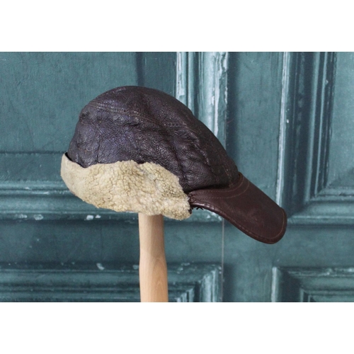 107 - WWII period USA sheepskin flying cap with leather peak