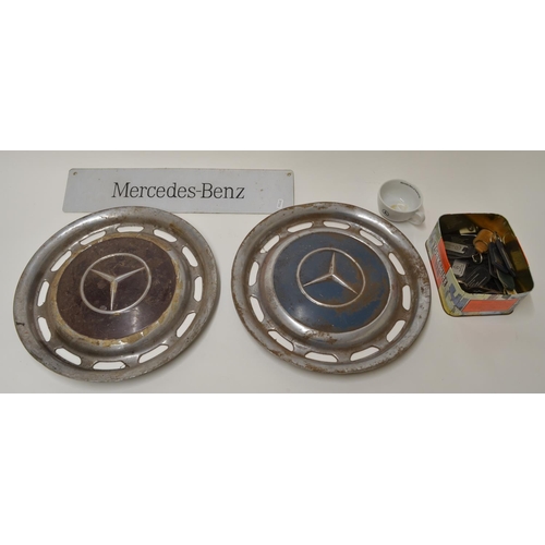 577 - Two vintage Mercedes Benz wheel hubs D39cm, collection of Mercedes Benz and dealership key fobs incl... 