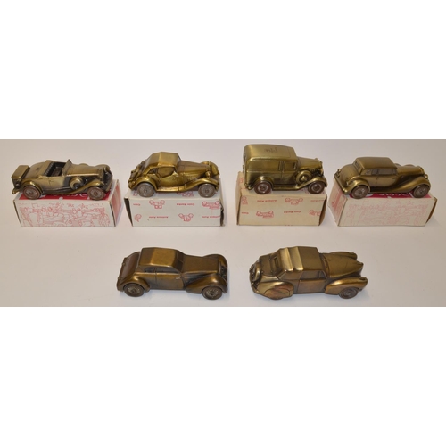 661 - 6 US made bronze car model coin boxes, 4 boxed. Average length approx 17cm.