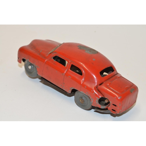 663 - Vintage post WWII clockwork metal car stamped 