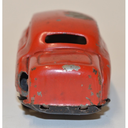 663 - Vintage post WWII clockwork metal car stamped 