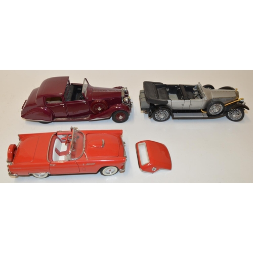 670 - 7 Franklin Mint 1/18 diecast model cars.