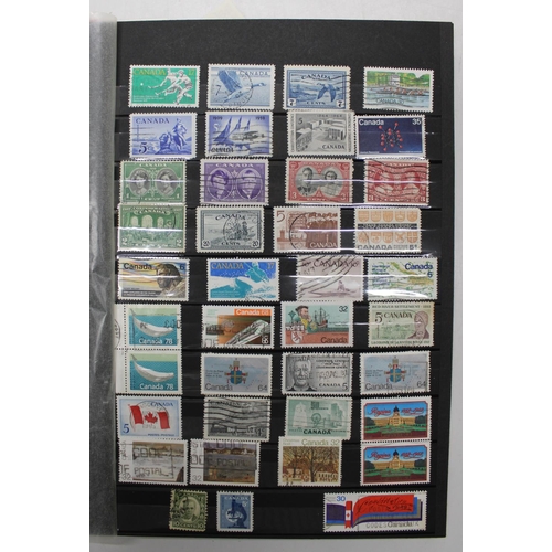 818 - Canada, Ireland and New Zealand stamp album, mostly ERII with some early to mid C20th examples and a... 