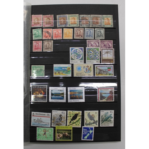 818 - Canada, Ireland and New Zealand stamp album, mostly ERII with some early to mid C20th examples and a... 