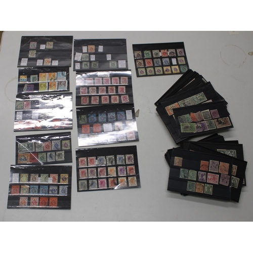 836 - Collection of mainly used GB and World stamps in black slip cards, some early inc. Hong Kong