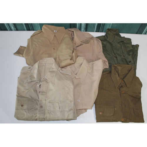 127 - Set of three cotton military shirts, one by Elbeco, and military desert tunic with brass belt buckle... 