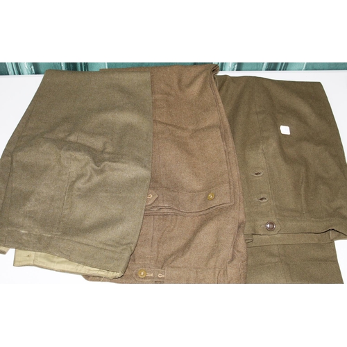 139 - Three pairs of WWII American nurses wool battle dress trousers with side button fastenings, one pair... 