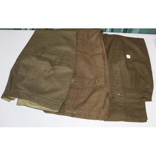 139 - Three pairs of WWII American nurses wool battle dress trousers with side button fastenings, one pair... 