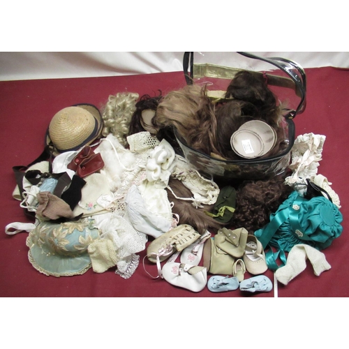 898 - Collection of Doll's wigs and accessories including bonnets, socks and shoes