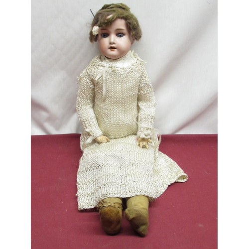 887 - Armand Marseille stamped A 370 AM-I-DEP, wearing brown wig, crochet dress, H52cm