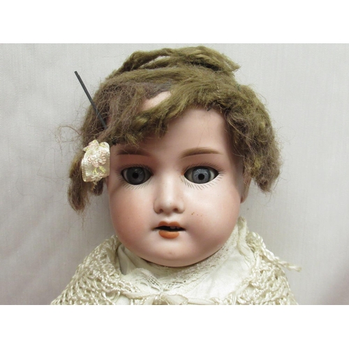 887 - Armand Marseille stamped A 370 AM-I-DEP, wearing brown wig, crochet dress, H52cm