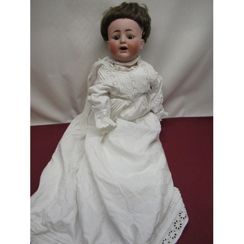 891 - Alt Beck & Gottschalk bisque headed doll, stamped 1361/55  60, wearing short brown wig and christeni... 