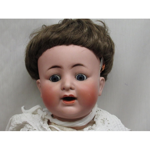 891 - Alt Beck & Gottschalk bisque headed doll, stamped 1361/55  60, wearing short brown wig and christeni... 