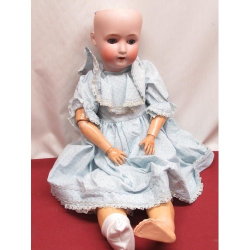 893 - Alt Beck & Gottschalk bisque headed doll, stamped 1362  3  11, with pierced ears, wearing blue spott... 