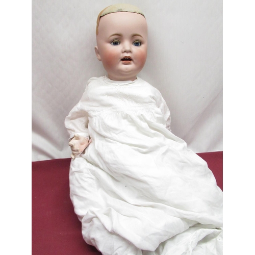 894 - German early C20th bisque headed doll indistinctly marked to back of neck with makers mark and numbe... 