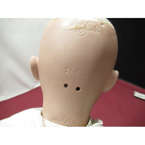 894 - German early C20th bisque headed doll indistinctly marked to back of neck with makers mark and numbe... 