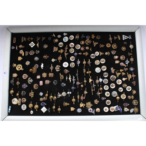 25 - Large collection of British military regimental sweetheart brooches, enamel pins etc with some commo... 