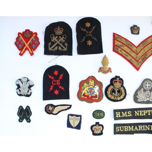 33 - Selection of British military and other mainly regimental cloth and embroidered patches, peak cap ba... 