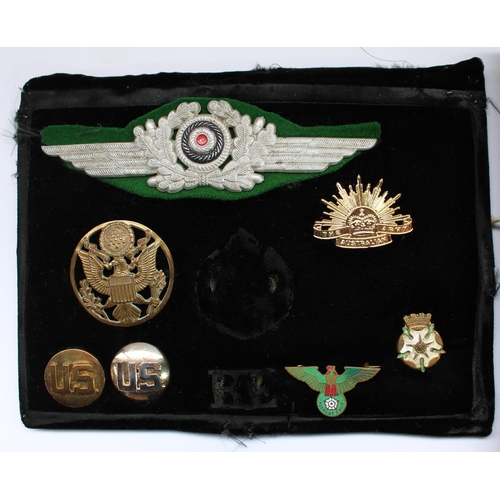 35 - Selection of world military cap badges and insignia, mainly US military but also a WW2 Luftwaffe NCO... 
