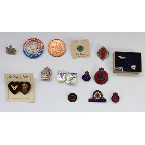 38 - Selection of British and American badges, enamel pins etc, including wartime fire watcher enamel bad... 