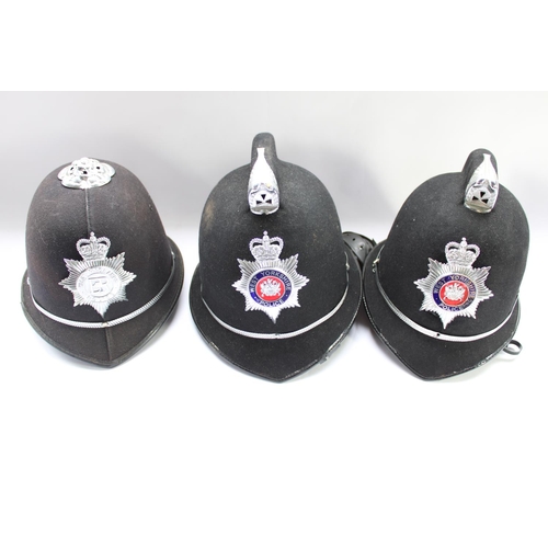 194 - Two vintage custodian helmets for West Yorkshire police and one for West Midlands police