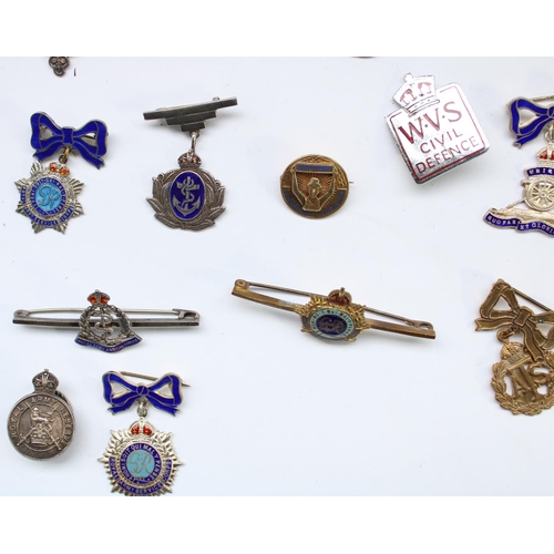 57 - Selection of enamel regimental, sweetheart and civilian association badges, many hallmarked silver, ... 