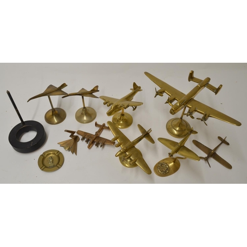 459 - Cast brass model airplanes including a Lancaster, Sunderland, Spitfire etc, and a cigar box with han... 