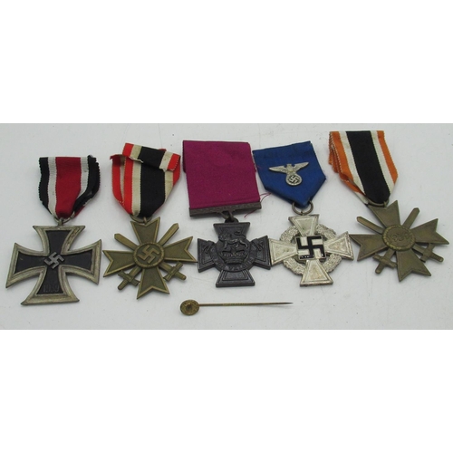 88 - Two German 1939 Merit Cross medals, infantry combat lapel pin, German faithful service medal (possib... 