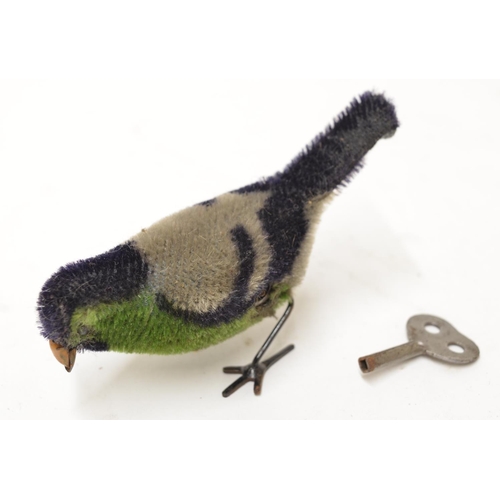 481 - Vintage wind up mechanical bird with key.