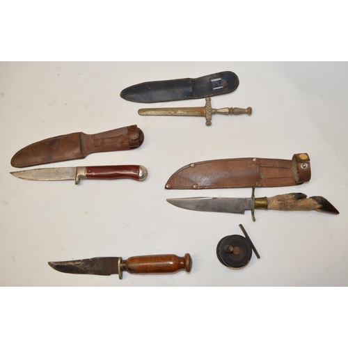 484 - Four vintage knives, one with 