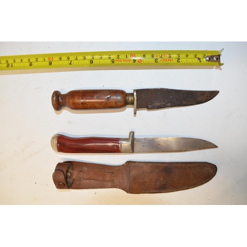 484 - Four vintage knives, one with 