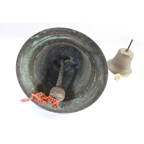 443 - C19th Solid bronze cast bell (very heavy) H30cm, together with a smaller early C20th cast metal bell