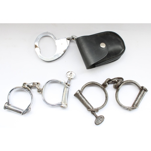 68 - Three pairs of Hiatt police handcuffs of different ages